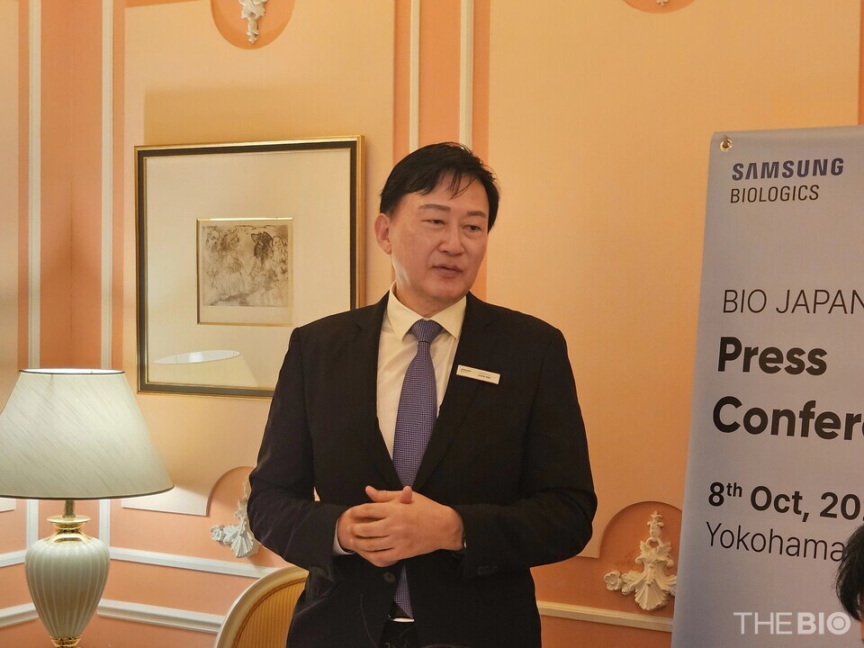 바카라 에볼루션 Biologics CEO John Rim outlines company's Japan business strategy during press conference at BioJapan 2025 in Yokohama, Japan, on October 8. (Photo: Reporter Yu Suin)